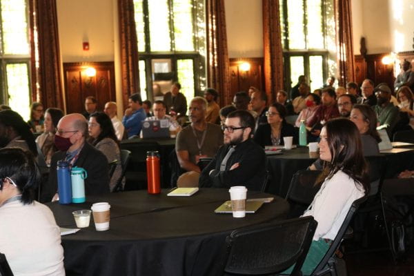 Attendees listening to the Opening remarks at the Cybersecurity Symposium